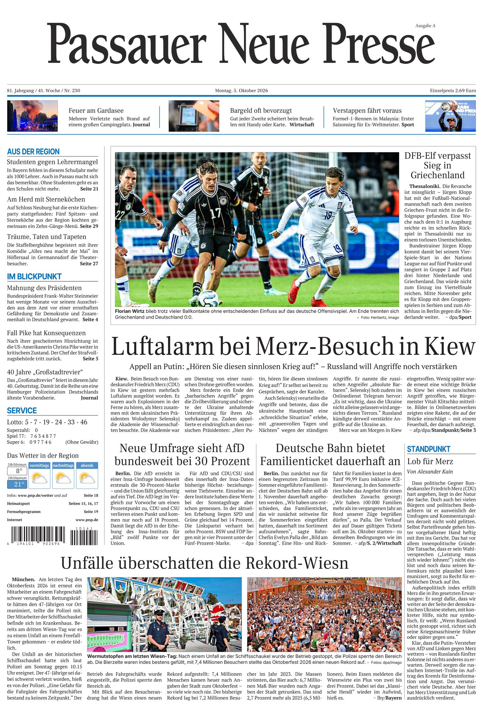 Passauer Neue Presse front page, 5 October 2026. Headline: Air raid alert during Merz's visit to Kyiv.